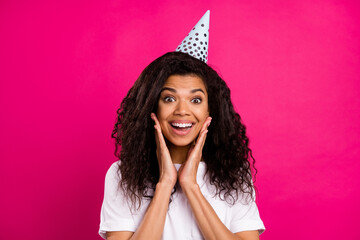 Poster - Photo of hooray brunette young party lady hands face wear cap white t-shirt isolated on pink color background