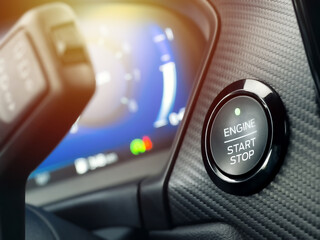 Car start button. near the dashboard Concept of transportation and technology