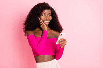 Sticker - Photo of excited crazy lady hold phone palm cheek wear top unclothed shoulders isolated pink color background