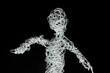 © Foto-Ruhrgebiet - Kleine menschliche Figur aus gebogenem Draht.