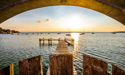 Canvas Print - old wooden jetty at a lake in bavaria