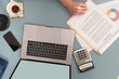 © Boy/Westend61 - Businessman signing contract document on table at home
