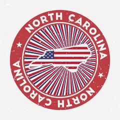 Wall Mural - North Carolina round stamp. Logo of us state with flag. Vintage badge with circular text and stars, vector illustration.