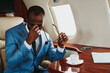 © OneInchPunch/Westend61 - Worried male entrepreneur sitting in private jet