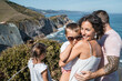 © SERGIO NIEVAS/Westend61 - family with 2 children enjoying the beach and cliffs of the Basque country