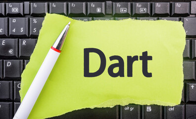 dart programming language. word dart on paper and laptop