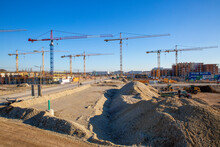 Germany, Bavaria, Munich, Large Construction Site With Cranes