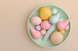 © Elisabeth C√∂lfen/Westend61 - Three dimensional render of plate with pastel colored fruits