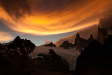 An Incredible Band Of Clouds At Sunset Surround Montt Fitz Roy In Patagonia, Argentina.