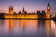 London's Parliament building reflected in the river Thames.