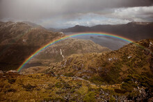 Double Rainbows Span The Side Of A Mountain In Chilean Southern Patagonia