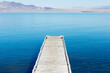 © Tandem Stock - A wooden pier reaches out into Pyramid Lake, Great Basin in the northwestern part of Nevada, USA