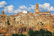 © Tandem Stock - Late afternoon light illuminates the medieval walled city of Pitigliano in Southern Tuscany, Italy.