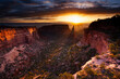 The sun rises above Independence Monument of Colorado National Monument near Grand Junction, Colorado.