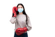 © PK Studio - Asian beautiful happy young woman wearing mask protection and boxing gloves her get ready for Coronavirus fighting against, with copy space