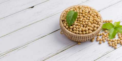 Soybean or soya bean in a bowl on white table background, healthy concept.