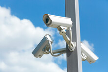 IP CCTV Camera. Concept Of Surveillance And Monitoring Camera With Parking Security System Concept.
