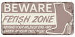 Beware Fetish Zone Message On Rusty Signboard