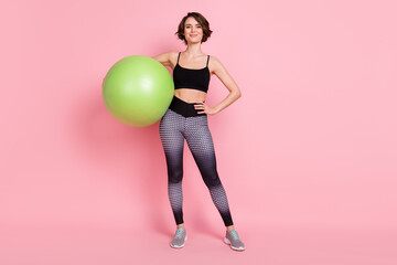 Canvas Print - Full body photo of young sportive girl happy positive smile hold fitball activity isolated over pink color background