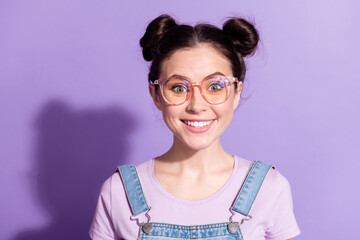 Photo of adorable satisfied lady toothy smile look camera wear glasses isolated on violet color background