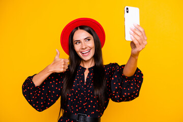Aufkleber - Photo of sweet shiny lady dressed black clothes arm cap tacking selfie gadget showing thumb up isolated yellow color background