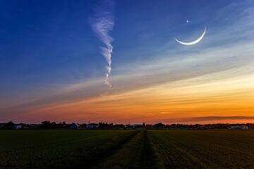 Wall Mural - moon with beautiful sunset background