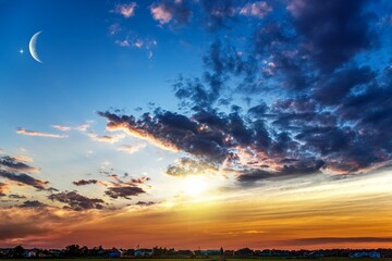 Wall Mural - moon with beautiful sunset background
