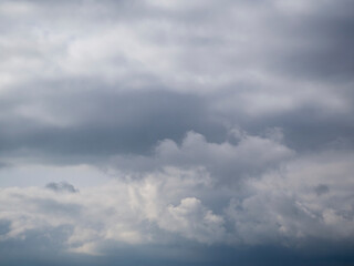 Overcast skies with heavy gray clouds in bad weather. Sky background with ash clouds that will rain down