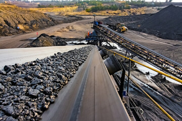 Wall Mural - Coal Ore on a conveyor belt for processing