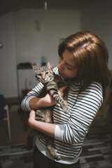 Poster - Cute female holding her cat