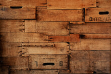 Wood Background Made Of Old Wine Crates In A Wine Cellar With Aged Texture