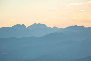 Sticker - Beautiful sunset over mountains with storm clouds in the background