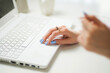 © Николай Амосеев - Woman typing on laptop keyboard in the office. Close up woman hands writing on laptop computer keyboard. home, freelancer, project, writing, communication, digital, monitor, notebook, student creative