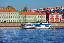 St. Petersburg. High-speed Passenger Hydrofoil Ship Of The Meteor Series On The Neva River On A Sunny Spring Day. Bright Cityscape. River Cruises And Travel