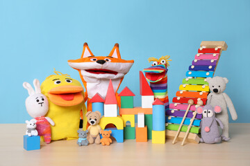 Sticker - Collection of different toys on wooden table