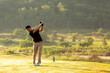© freebird7977 - Golfer sport course golf ball fairway.  People lifestyle man playing game golf tee off on the green grass.  Asian man player game shot in summer