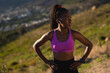 © Wavebreak Media - Fit african american woman with wireless earphones during exercise in countryside