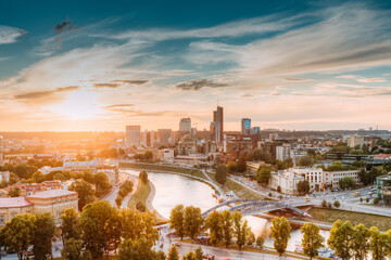 Canvas Print - Vilnius, Lithuania. Sunset Sunrise Dawn Over Cityscape In Evening Summer. Beautiful View Of Modern Office Buildings Skyscrapers In Business District New City Centre Shnipishkes