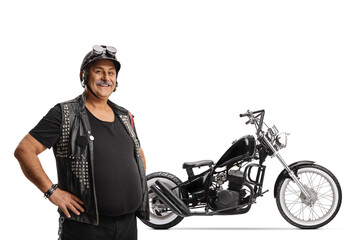 Sticker - Mature biker with a leather vest and a helmet standing next to his chopper