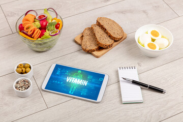 Tablet Pc with fruits, medical concept