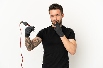 Wall Mural - Tattoo artist man over isolated white background having doubts while looking up