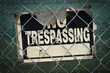 Aged and worn no trespassing urban sign