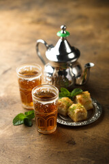 Wall Mural - Traditional Moroccan tea with fresh mint