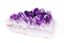 Macro Mineral Stone Purple Amethyst In Crystals On A White Background