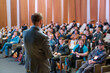 © Anton Gvozdikov - Male presenter speaks to audiences at seminar