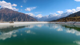 Fototapeta Natura - Beautiful Auli lake with snow cap Himalayas mountains in the backdrops Joshi math Uttarakhand 