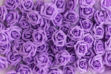 Artificial Purple Or Lilac Roses, Foamiran Roses. Background Of Purple Or Lilac Flowers. Fake Flowers.