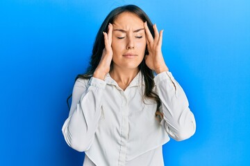 Poster - Young brunette woman wearing casual clothes with hand on head, headache because stress. suffering migraine.