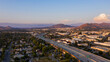 Aerial sunset view of the residential and industrial areas of Riverside, California.