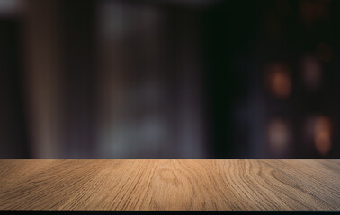 Empty wooden table in front of abstract blurred background of coffee shop . can be used for display or montage your products.Mock up for display of product